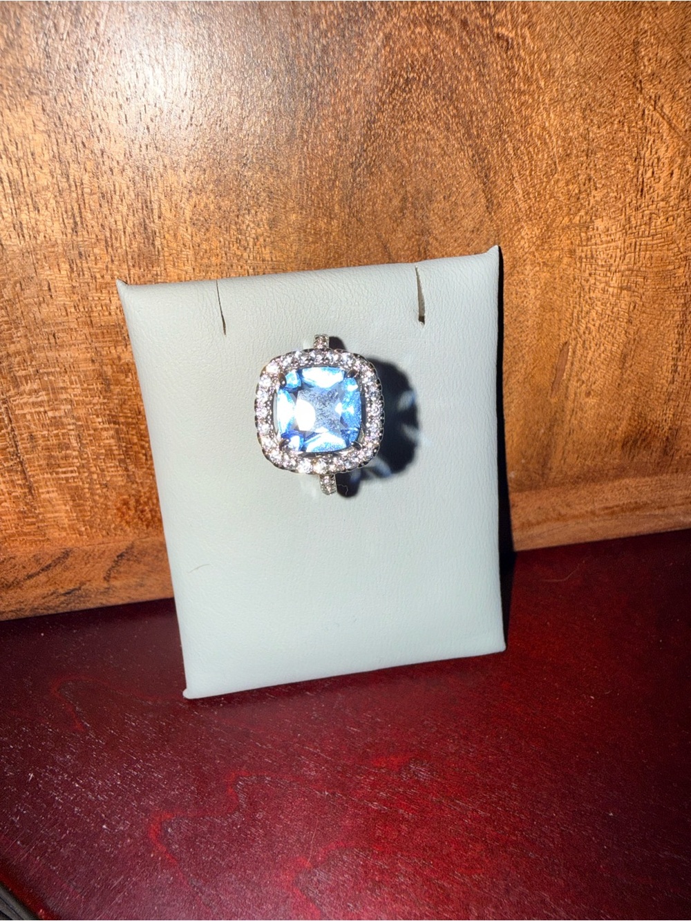 Silver Ring with Blue Cushion-Cut Center Stone and Halo